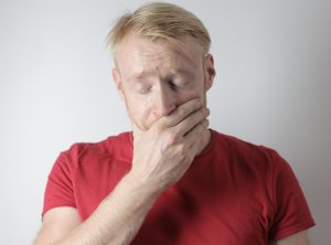 Man with tooth pain needs to see Boise ID emergency dentist at Blaisdell Family Dentistry