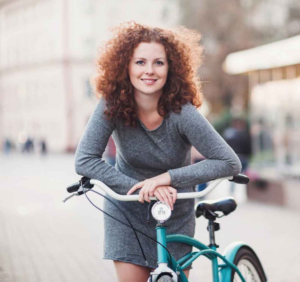 Cosmetic Dentistry patient with a bicycle in Boise.