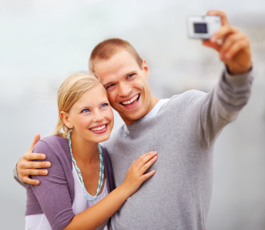 A young couple smiling after whitening treatments in Boise.